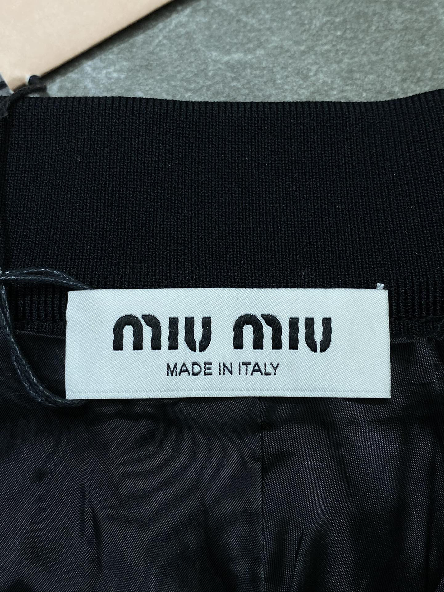 MIU Threaded Woven Letter Logo High Waisted Pleated Skirt