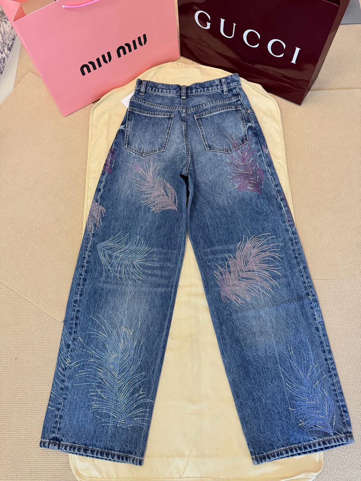 CHANE rhinestone feather jeans