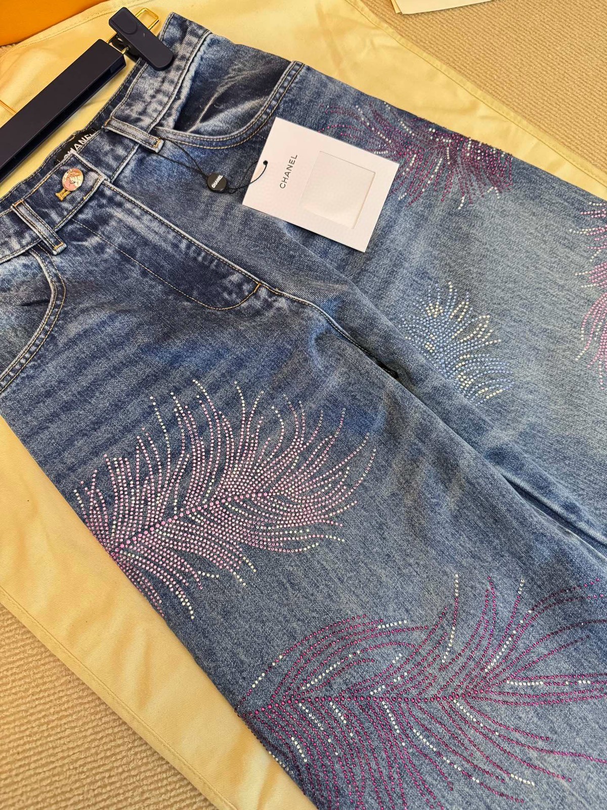 CHANE rhinestone feather jeans