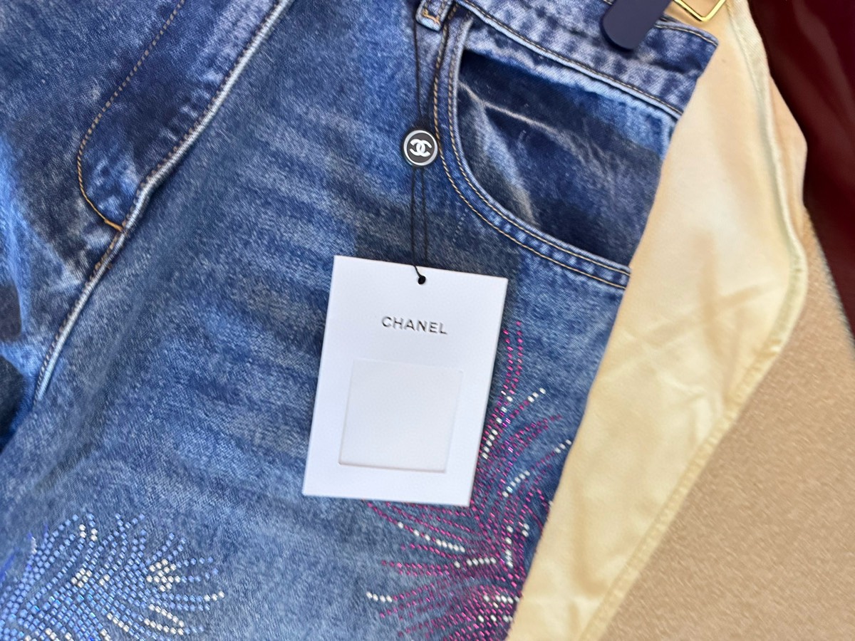 CHANE rhinestone feather jeans