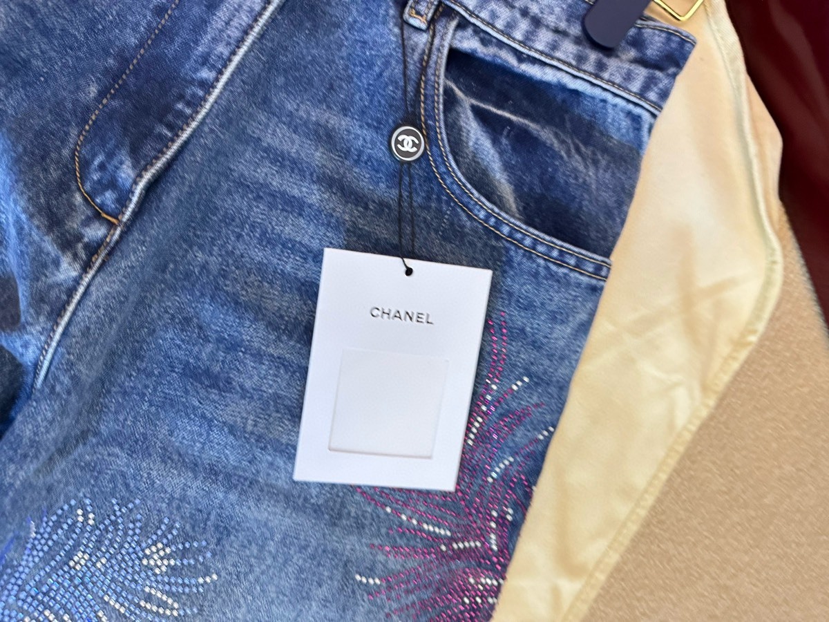 CHANE rhinestone feather jeans