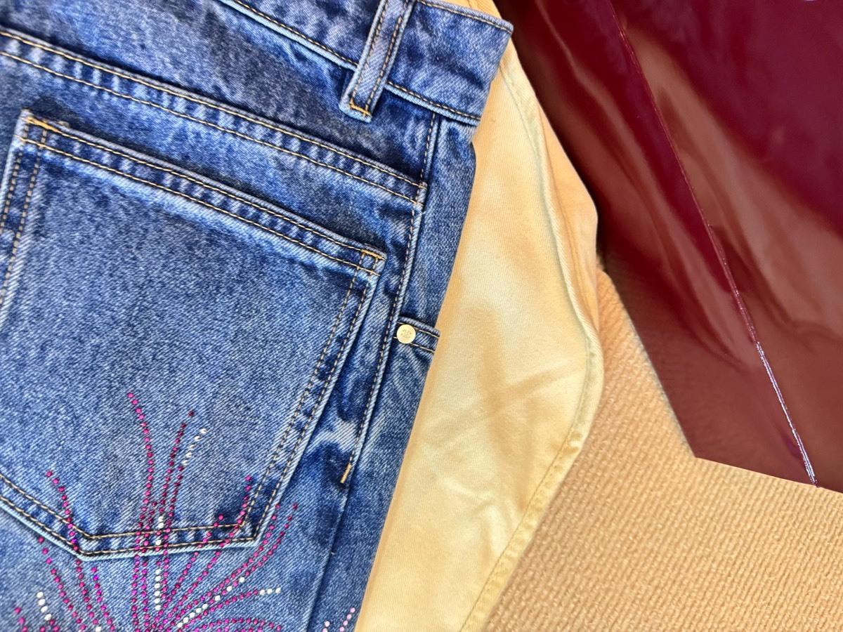 CHANE rhinestone feather jeans