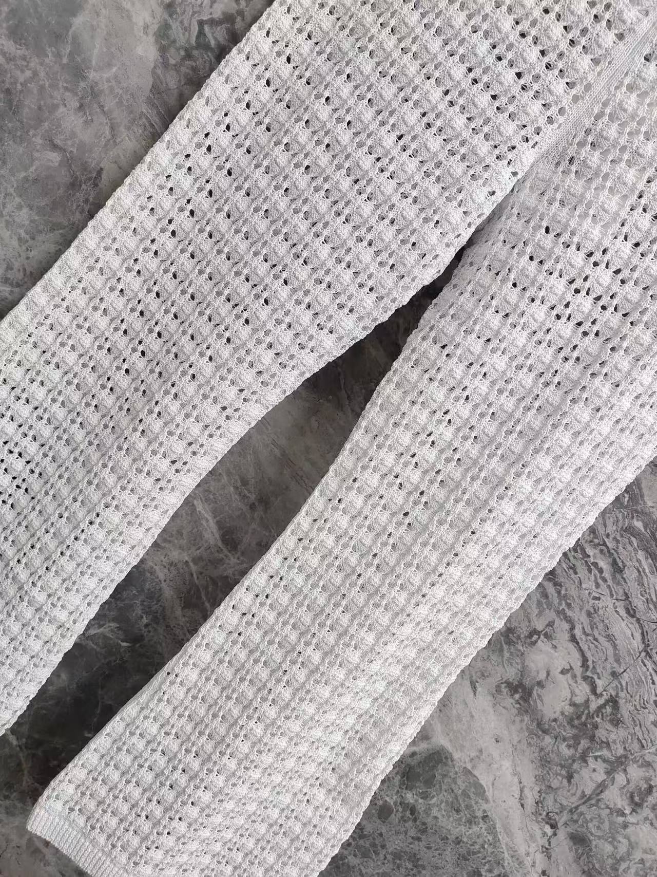 CC 26SS  Vacation style white hollow knitted pants