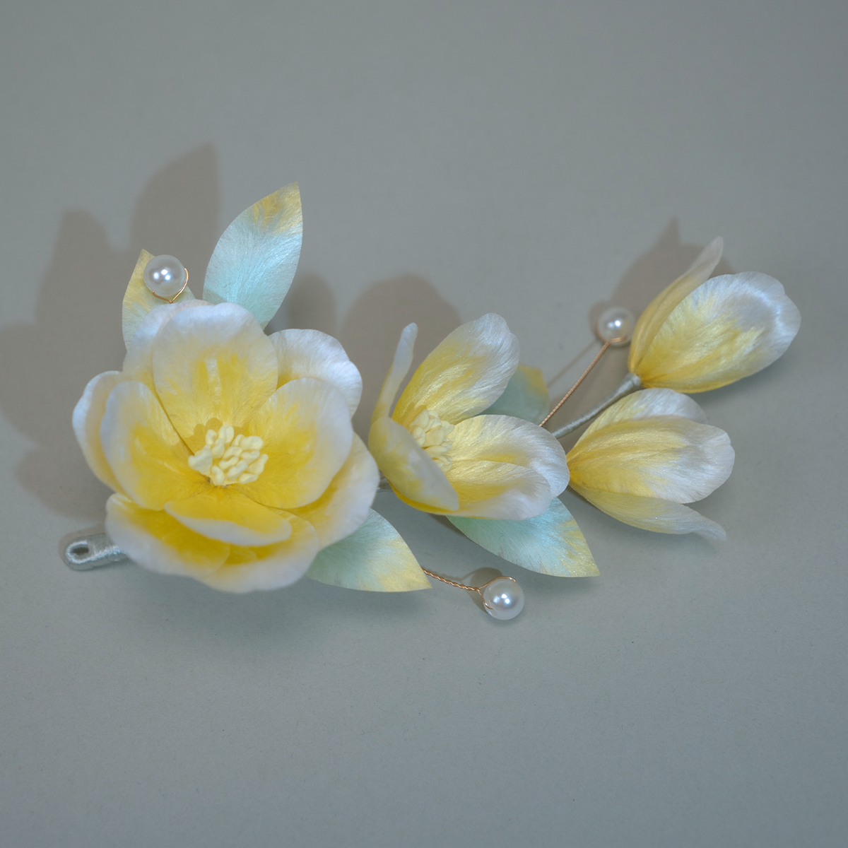 Traditional hand-crafted intangible cultural heritage velvet flower hairpin made of silk.