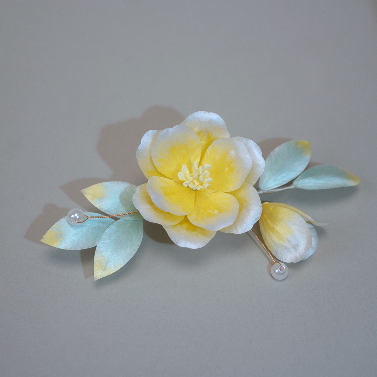 Traditional hand-crafted intangible cultural heritage velvet flower hairpin made of silk.