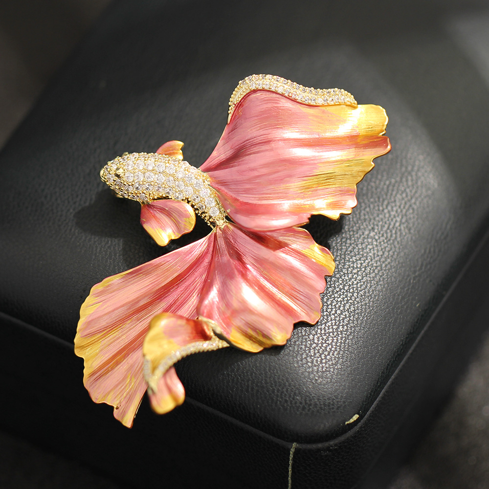 Light luxury high-end enamel blue and red flowing flying fish brooch, exquisite marine creature pin for men and women