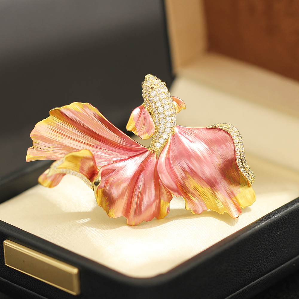 Light luxury high-end enamel blue and red flowing flying fish brooch, exquisite marine creature pin for men and women