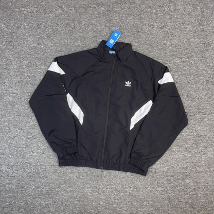 adidas Originals Rekive graphic detail woven track top in green