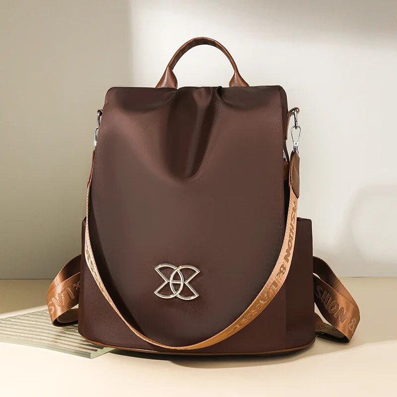 Taška přes rameno s ochranou proti krádeži a diskrétním zapínáním na zadní straně - Lyvazza™