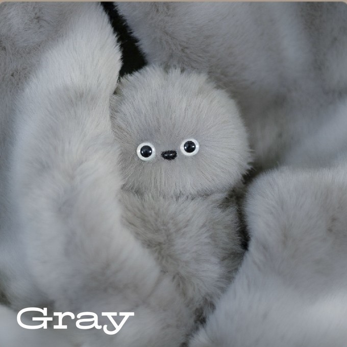 Mirumi: A Charm Robot that Steals a Glance—and Your Heart