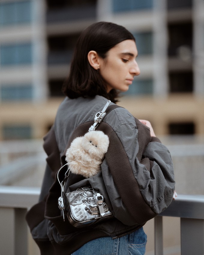 Mirumi: A Charm Robot that Steals a Glance—and Your Heart