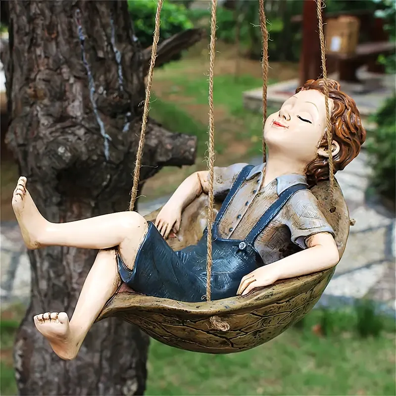 Handcrafted Walnut Boy Swing Resin Sculpture 