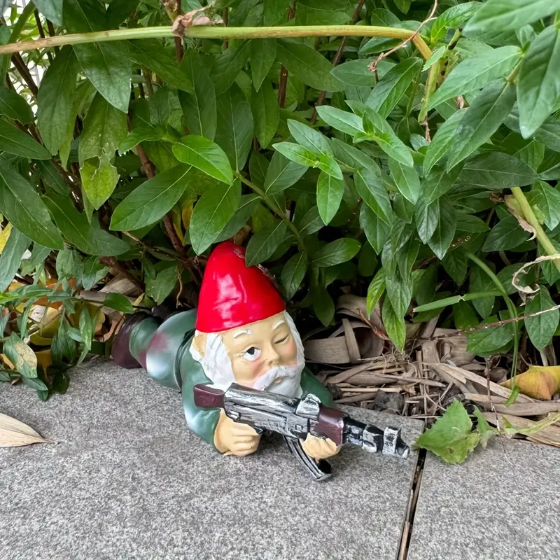 Three dwarf soldiers holding AK-47 rifles