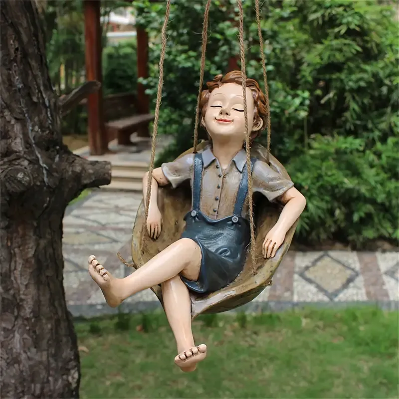 Handcrafted Walnut Boy Swing Resin Sculpture 