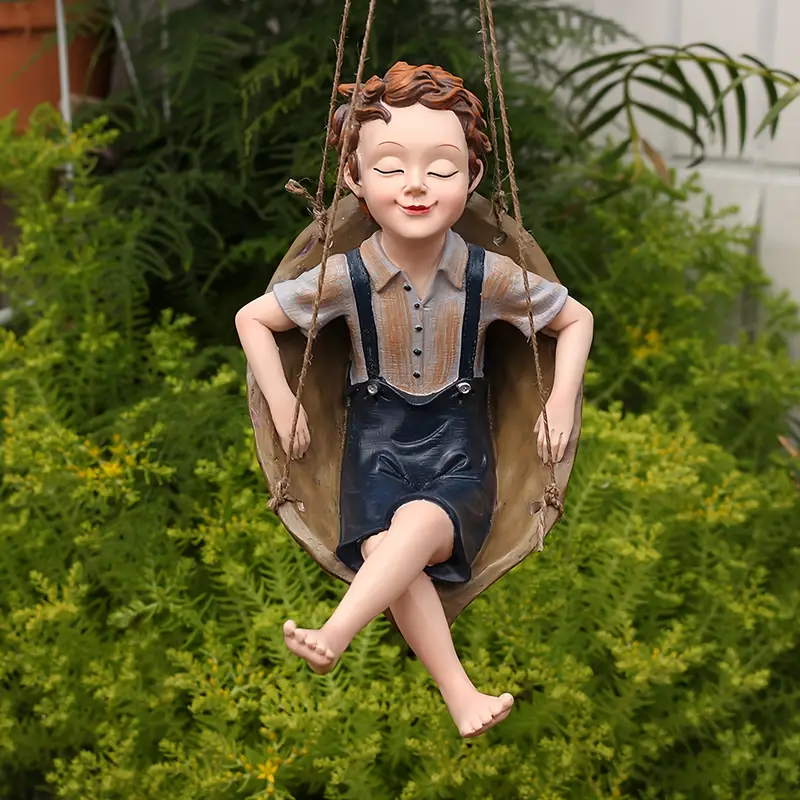 Handcrafted Walnut Boy Swing Resin Sculpture 