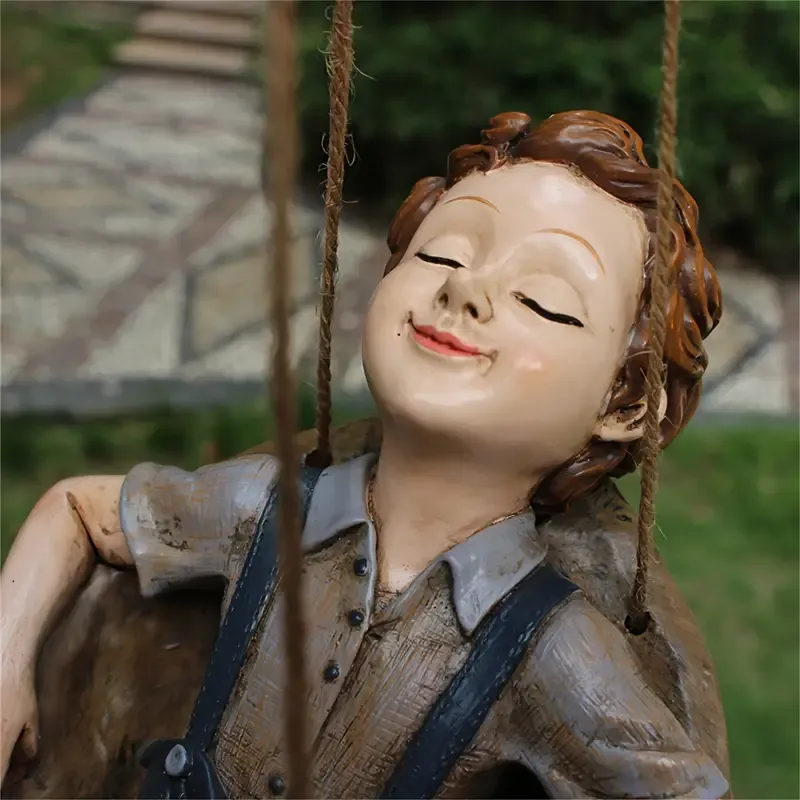 Handcrafted Walnut Boy Swing Resin Sculpture 