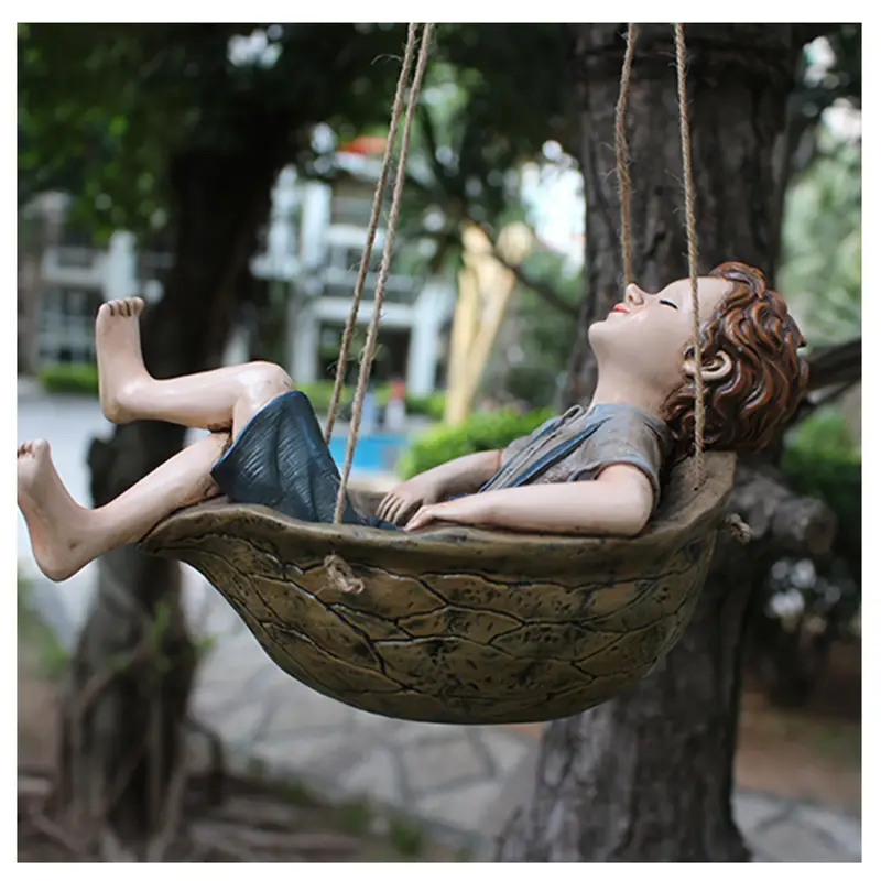 Handcrafted Walnut Boy Swing Resin Sculpture 