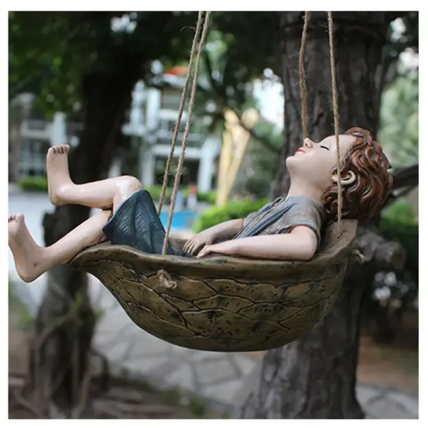 Handcrafted Walnut Boy Swing Resin Sculpture 