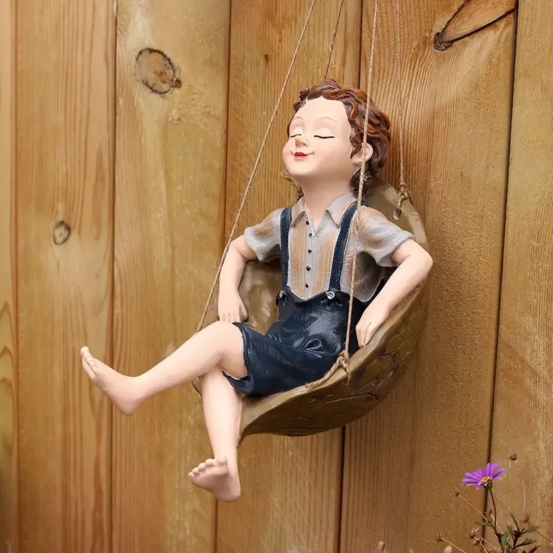 Handcrafted Walnut Boy Swing Resin Sculpture 