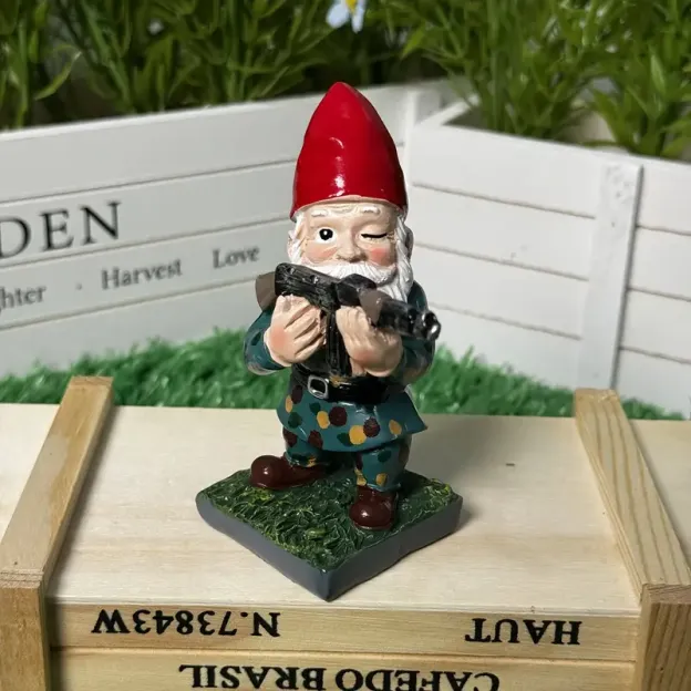 Three dwarf soldiers holding AK-47 rifles