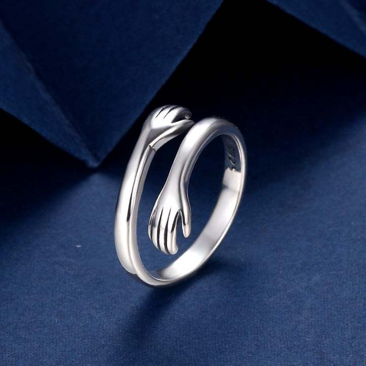 ADJUSTABLE HUG RING