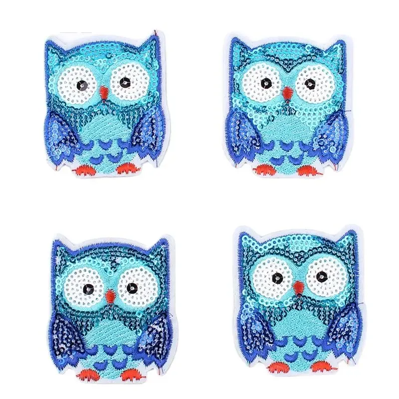 Four blue owls on a white background.