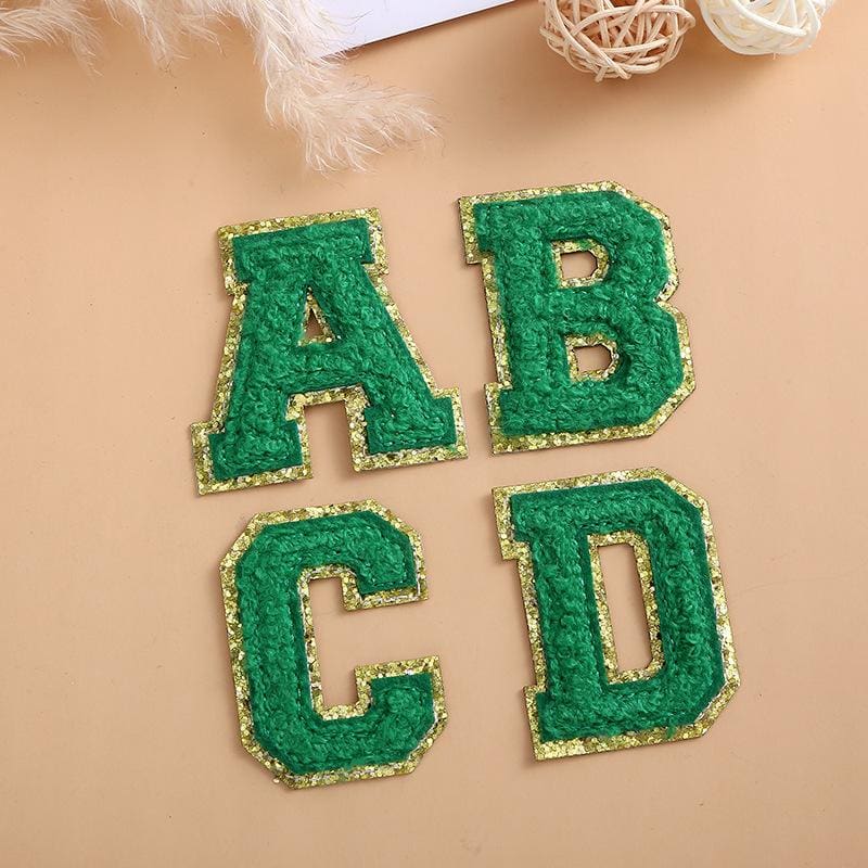Green self adhesive letter patches