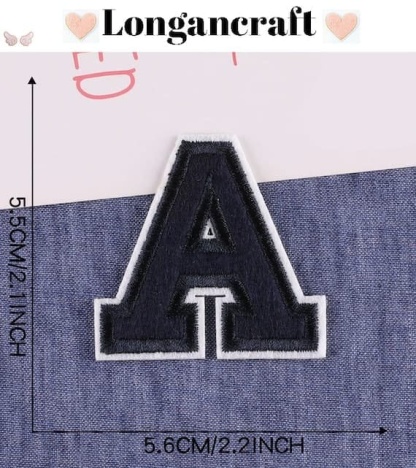 The letter a embroidered on a denim shirt.