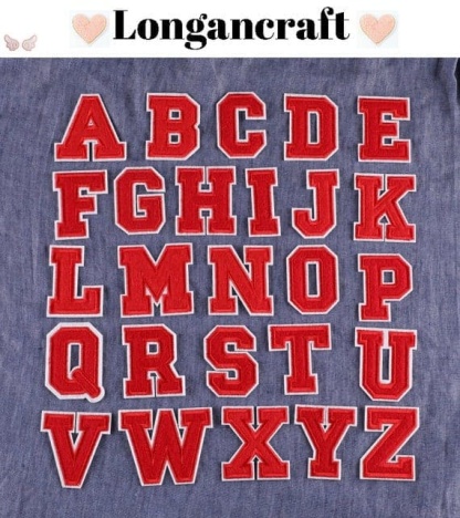 A set of red letter embroidered patches.