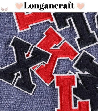 A set of red and blue letter embroidered patches.
