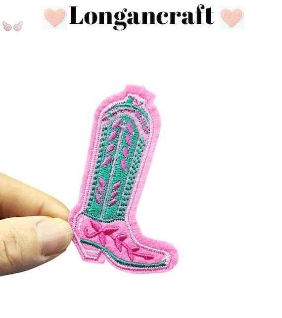 a pink cowgirl embroidery patch