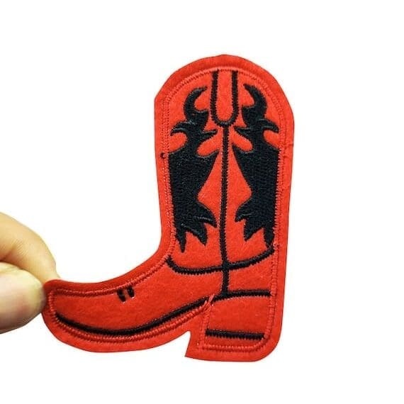 a red cowboy boot embroidered patch.