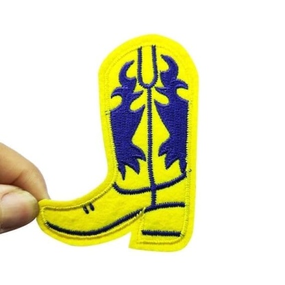 a yellow cowboy boot embroidered patch.