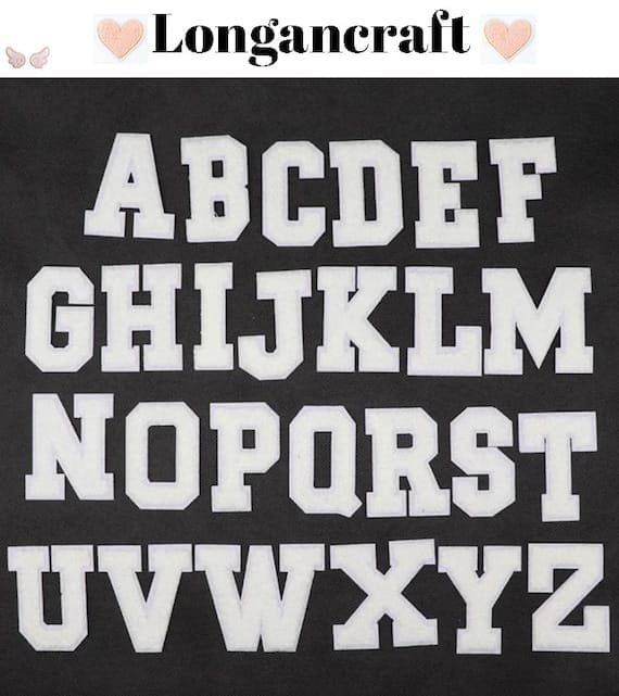 A black shirt with white letters and numbers on it.