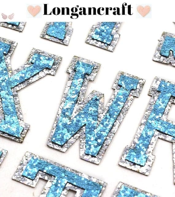 A set of Light Blue Sequin Letters Patches