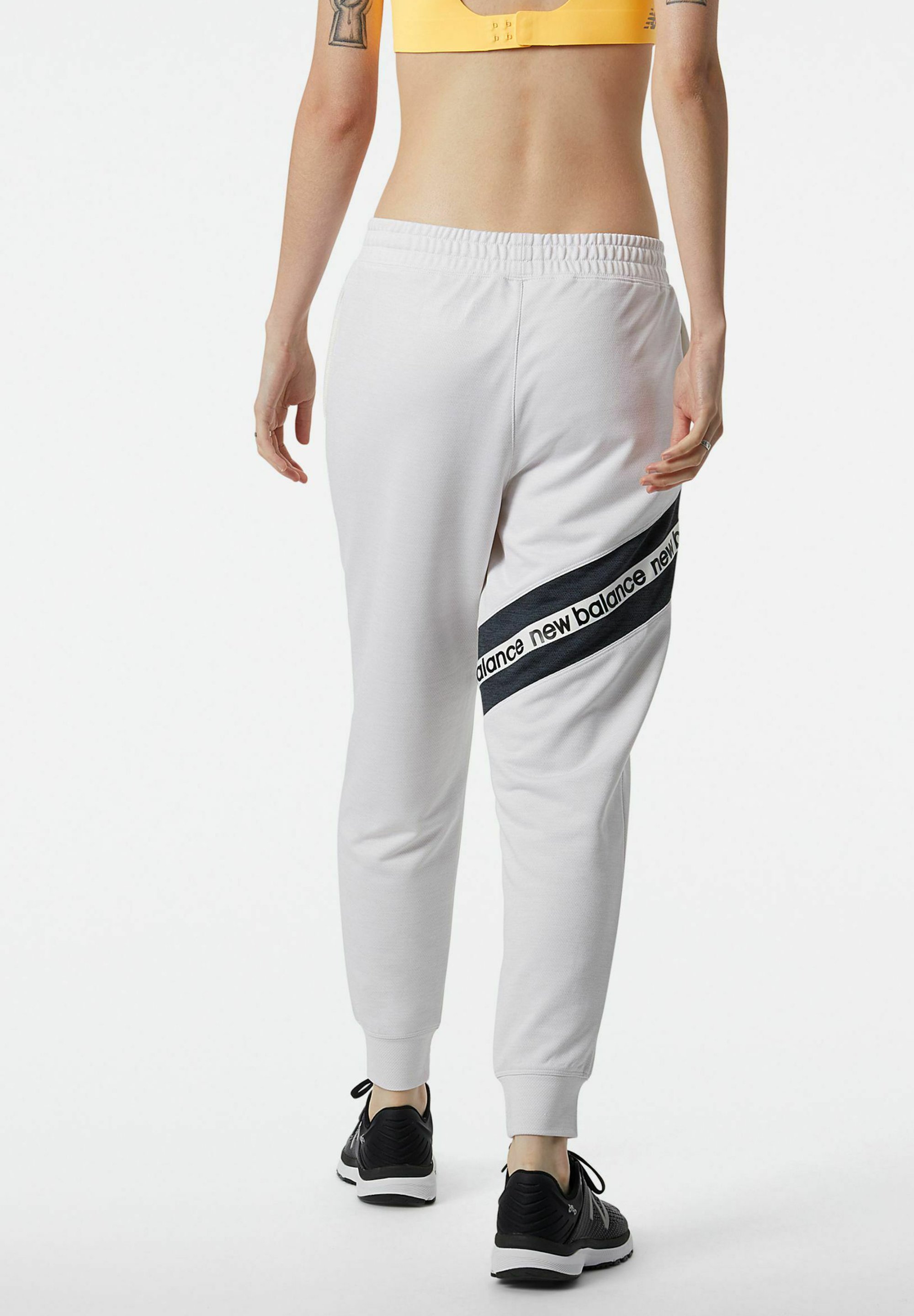 New Balance RELENTLESS TERRY JOGGER - Pantalones deportivos - sea salt
