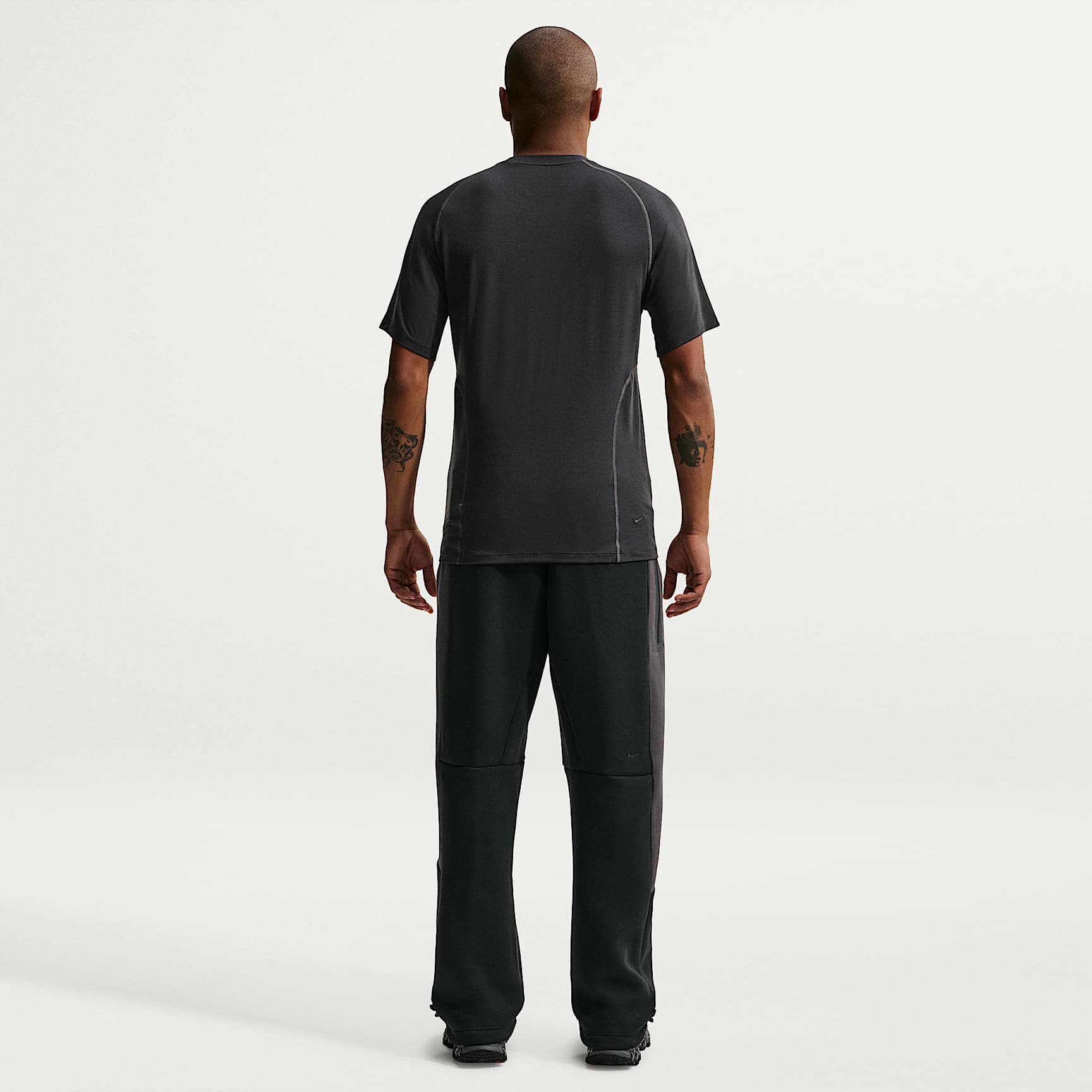 Nike Tech - Nike Tech Fleece-Hose mit offenem Saum und Farbblock-Design (Herren)
