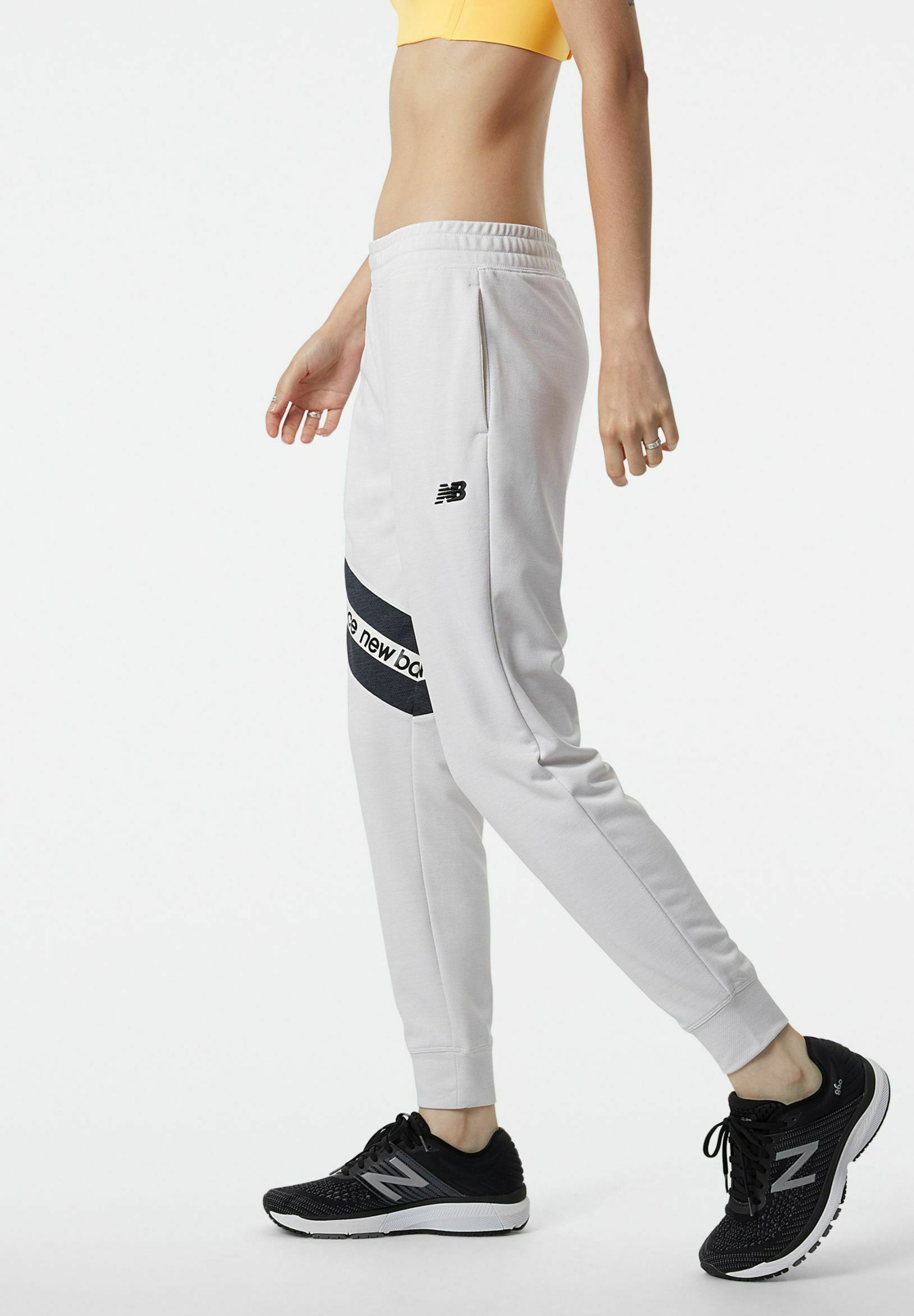 New Balance RELENTLESS TERRY JOGGER - Pantalones deportivos - sea salt