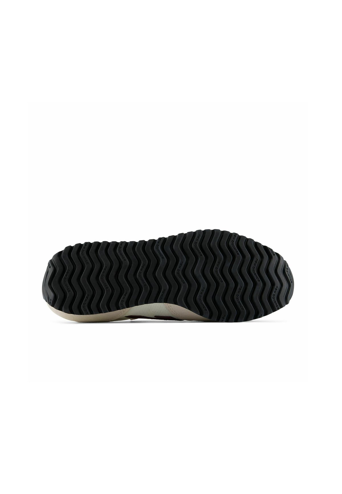 Suela de un zapato con patrón de dibujo en zigzag negro y pequeña marca en las zonas elevadas.