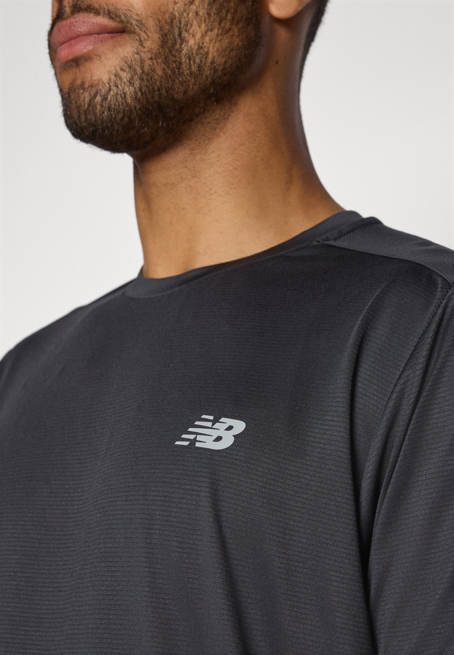 New Balance SPORT ESSENTIALS - Camiseta deportiva - black
