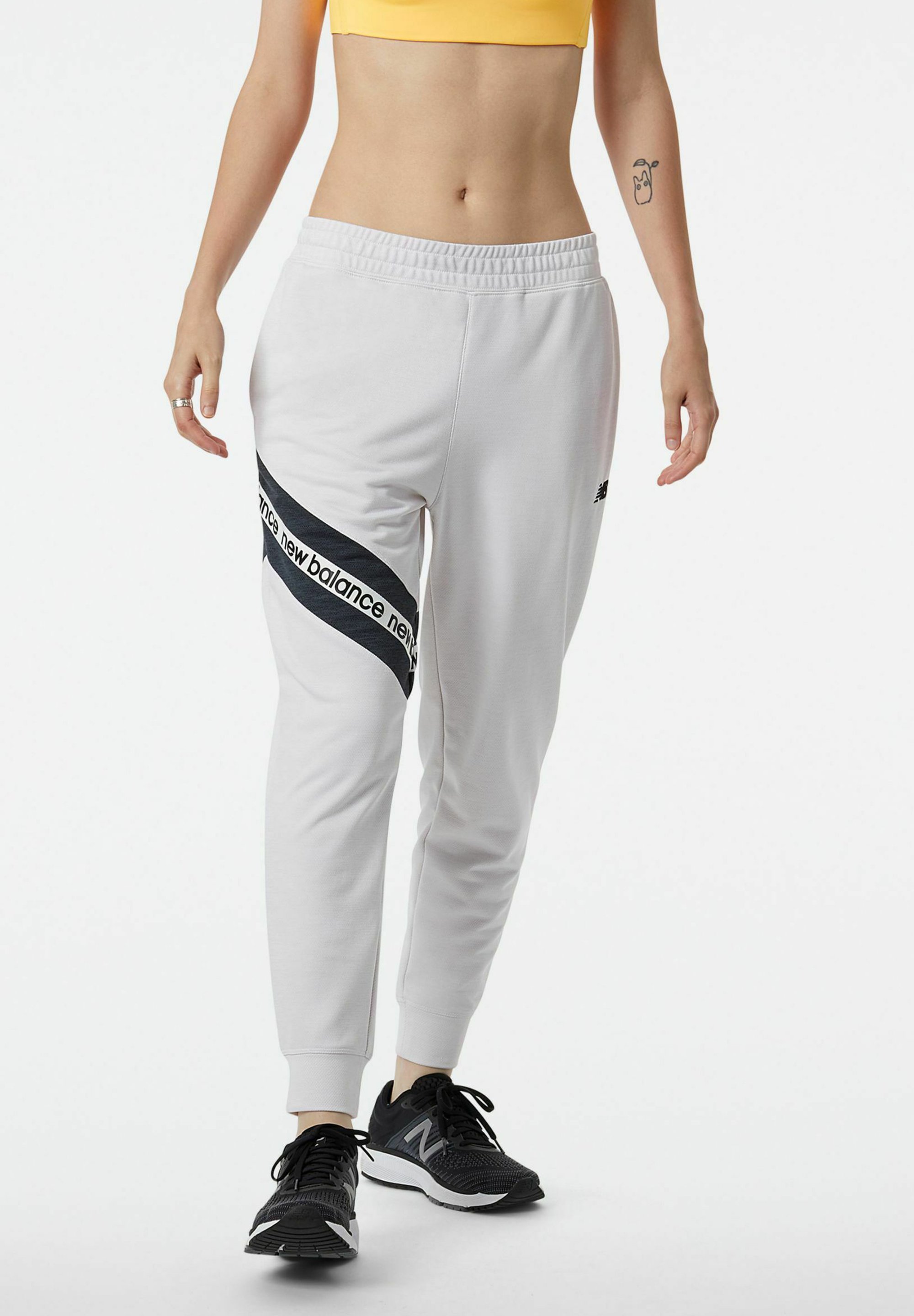 New Balance RELENTLESS TERRY JOGGER - Pantalones deportivos - sea salt