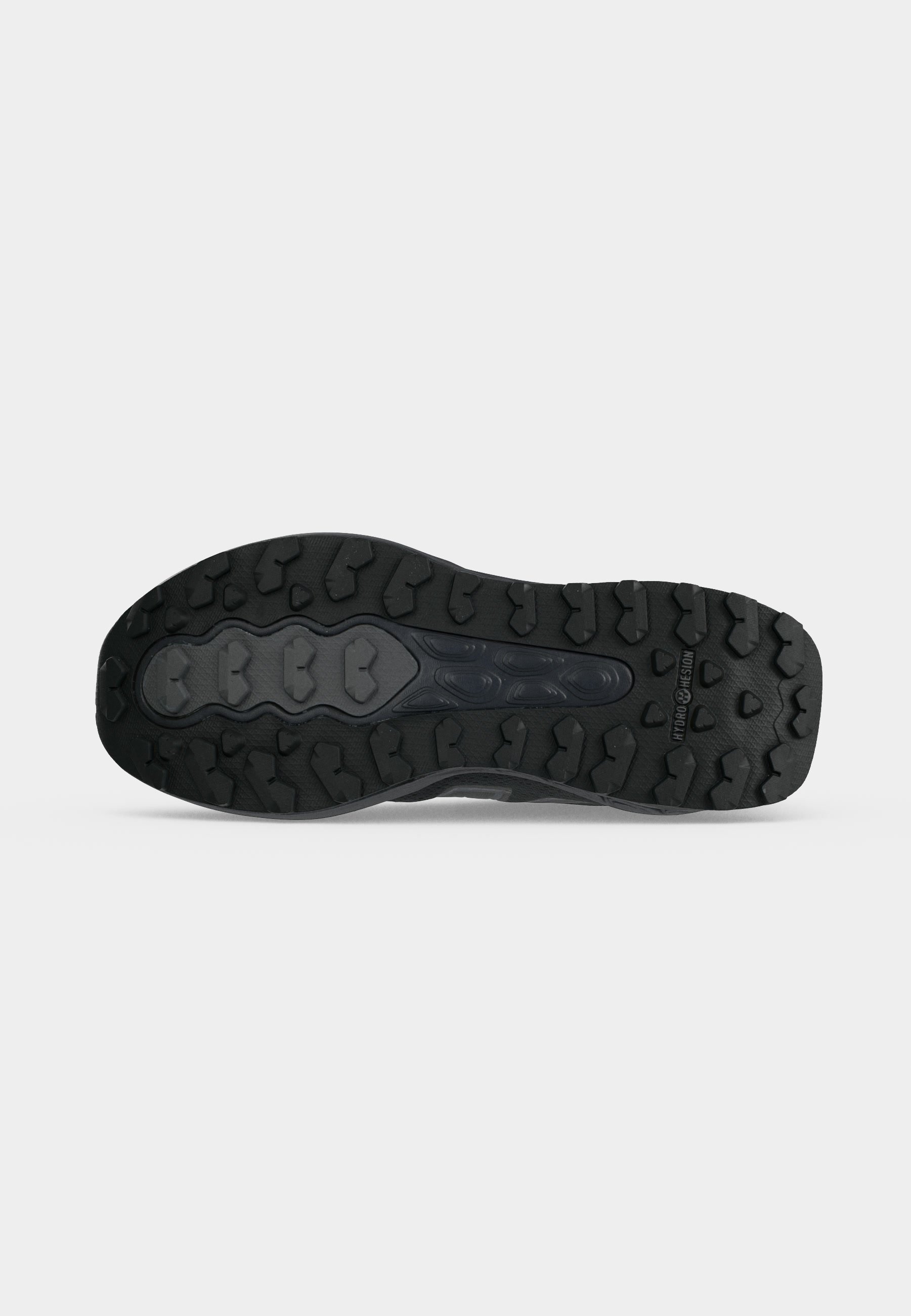 Suela de zapato negra con un patrón de dibujo profundo y resistente diseñado para la tracción, que cuenta con una zona de agarre central y la etiqueta "HYDROPHESION."