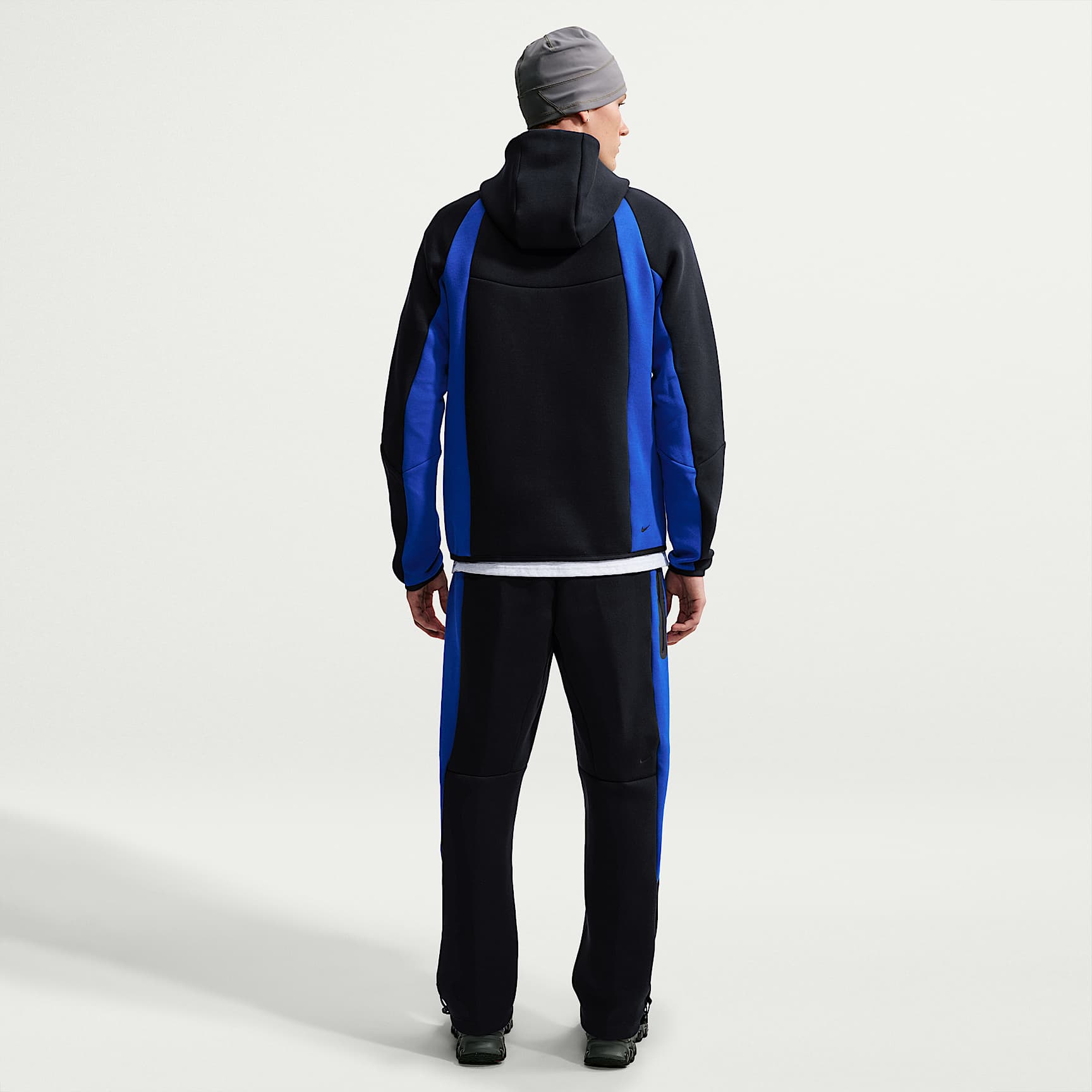 Nike Tech - Nike Tech Fleece-Hose mit offenem Saum und Farbblock-Design (Herren)