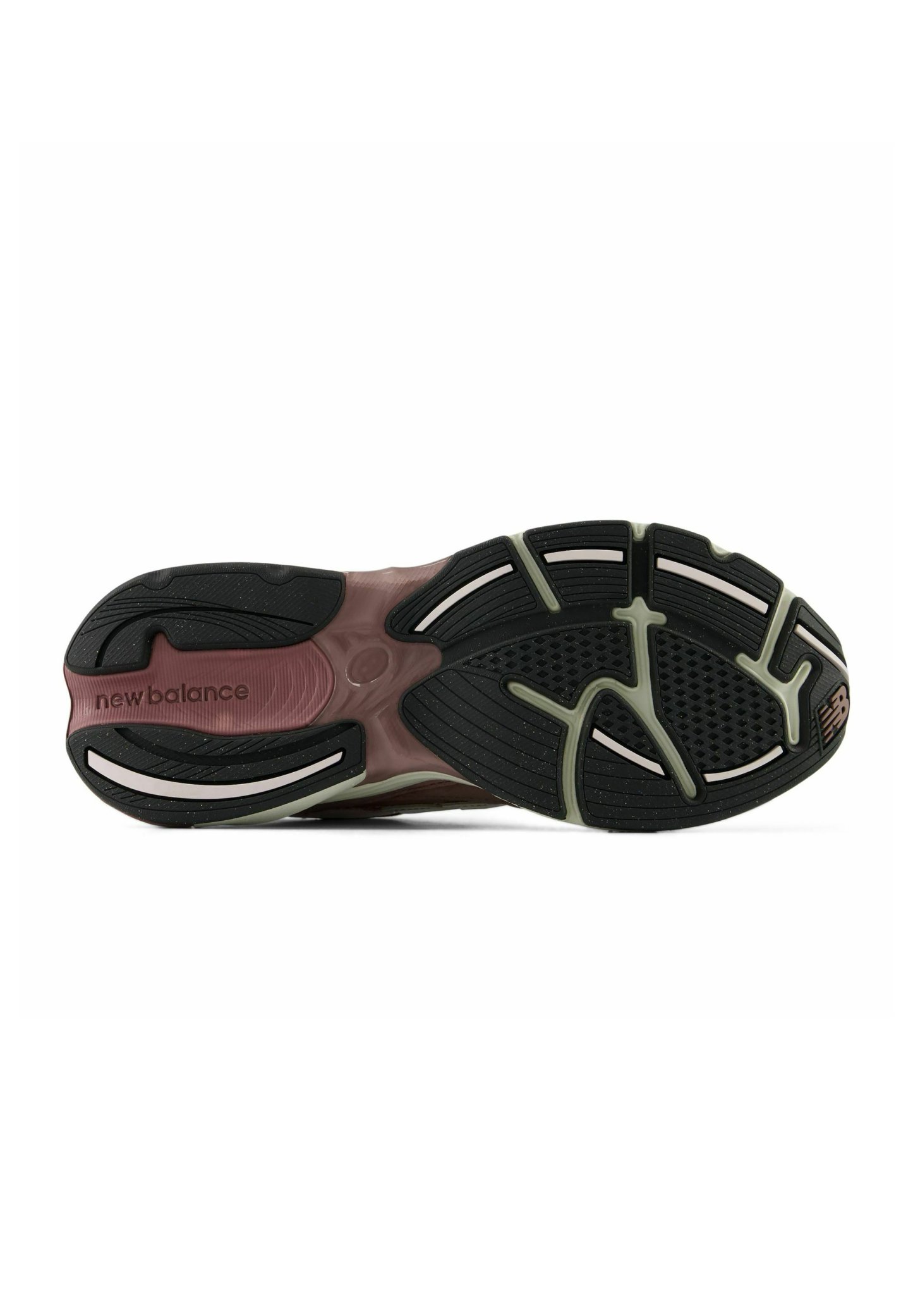 Suela de zapatilla New Balance mostrando una suela negra y marrón con agarre texturizado y el nombre de la marca cerca del talón.