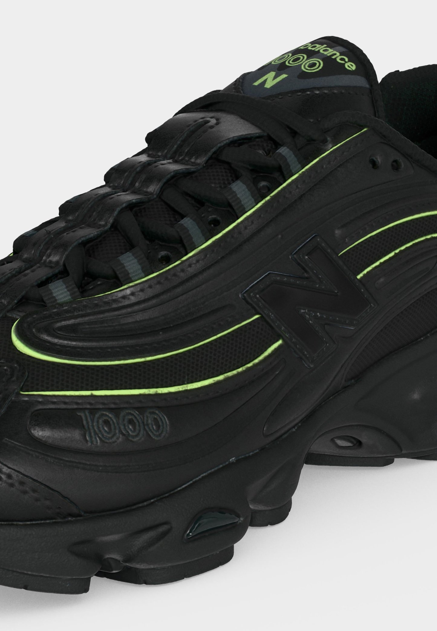 Zapatilla negra New Balance 1000 con acentos en verde neón, materiales de malla y cuero, cierre con cordones y suela gruesa acolchada.