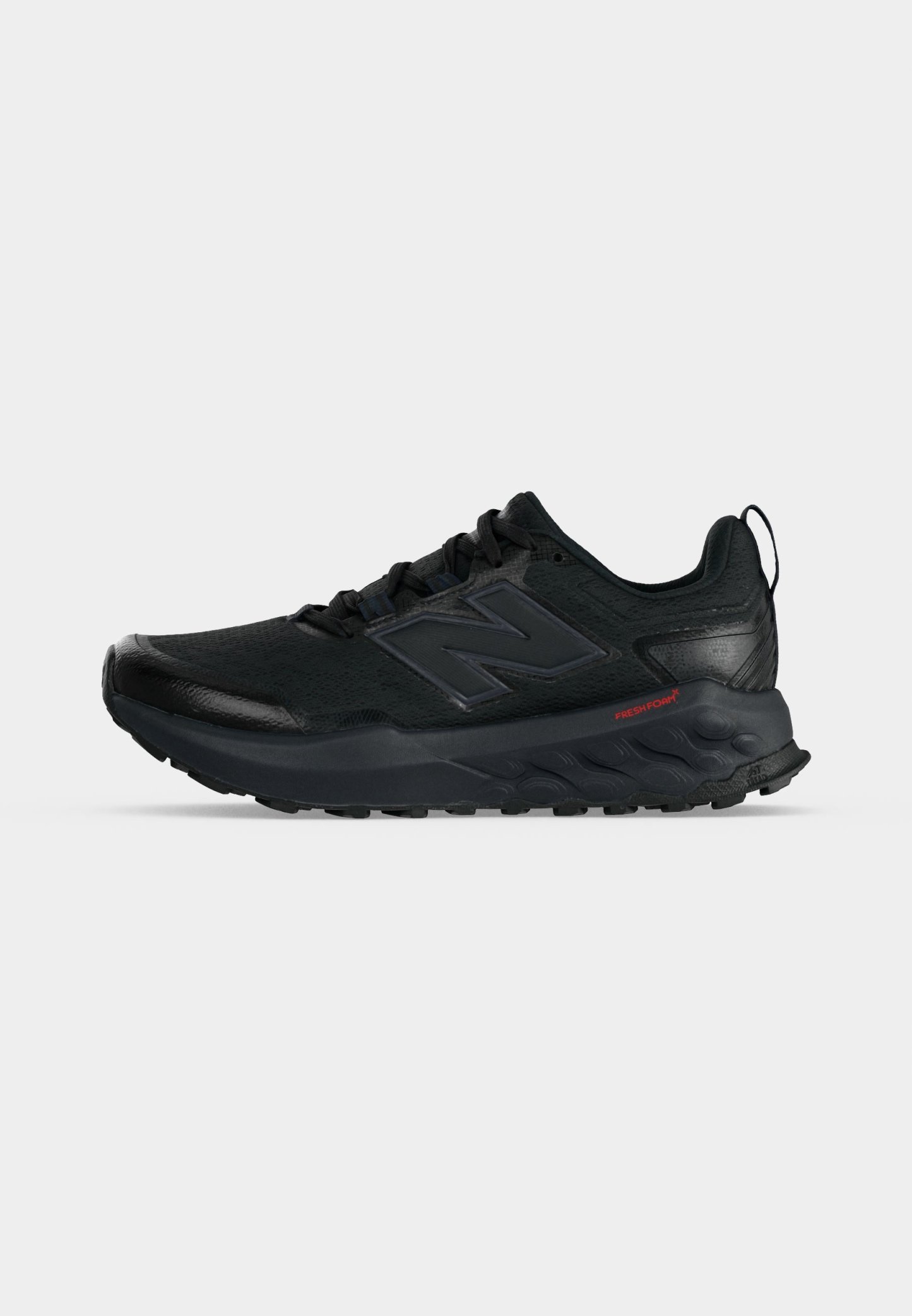 Zapato deportivo negro con parte superior de malla, suela acolchada con la etiqueta Fresh Foam y logo "N" en el lateral, mostrado en perfil derecho sobre fondo blanco.