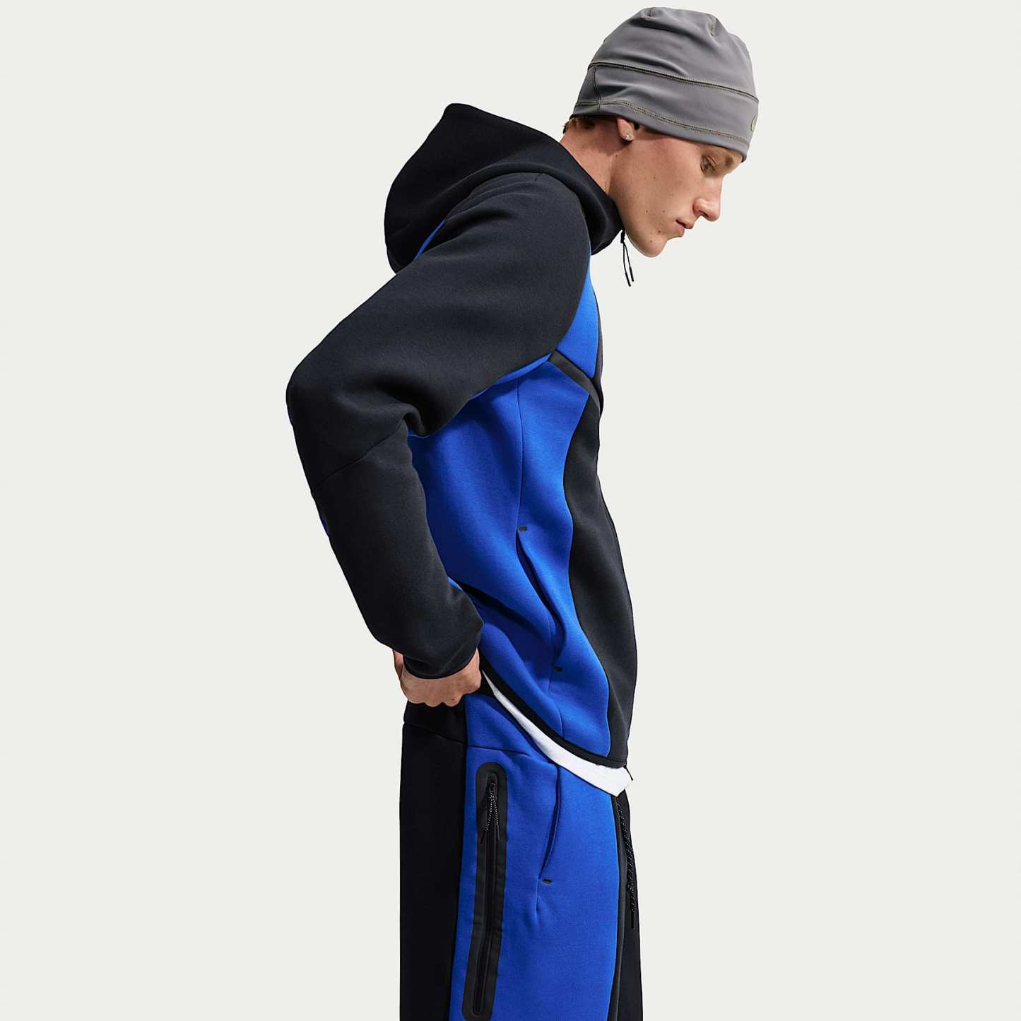 Nike Tech - Nike Tech Fleece-Hose mit offenem Saum und Farbblock-Design (Herren)