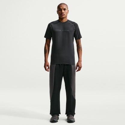 Nike Tech - Nike Tech Fleece-Hose mit offenem Saum und Farbblock-Design (Herren)