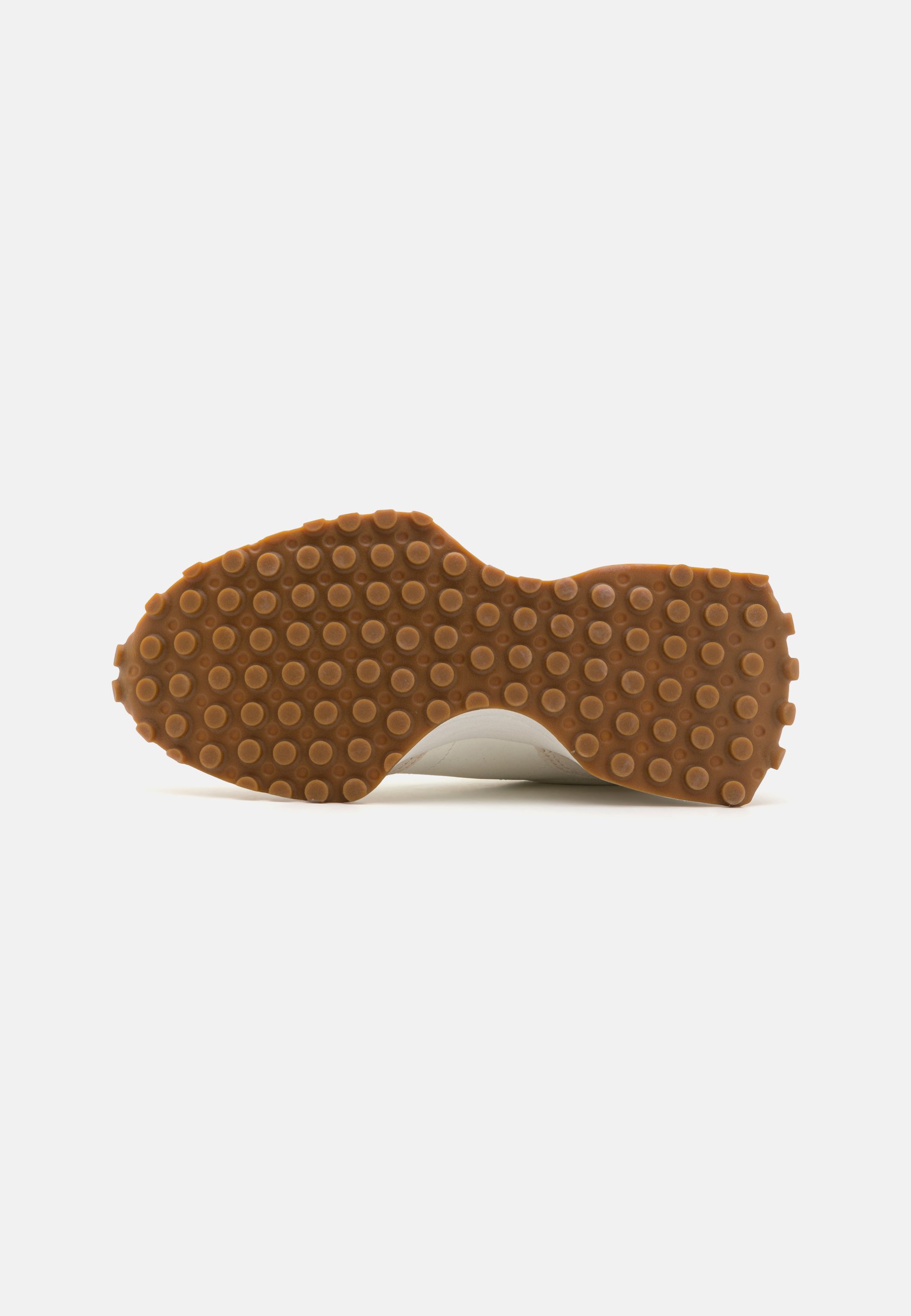 Suela de zapato con una superficie de goma marrón texturizada que presenta patrones circulares. Parte superior blanca lisa visible en los bordes. Diseño limpio y plano.