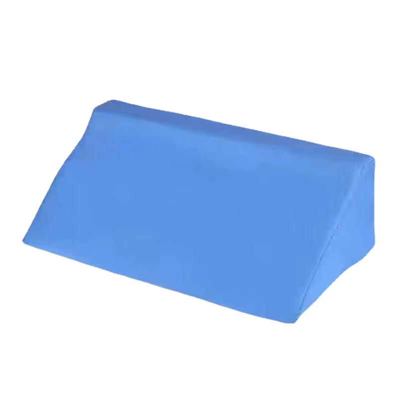 The bedridden elderly person is in a lateral position with a sponge pillow when turning over